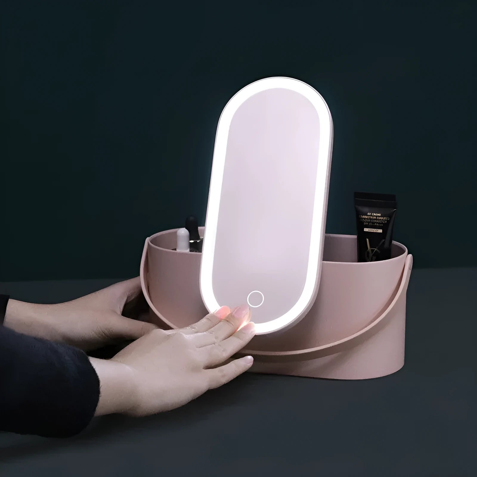 Pink portable makeup storage box with LED illuminated aluminium mirror and cosmetic compartments