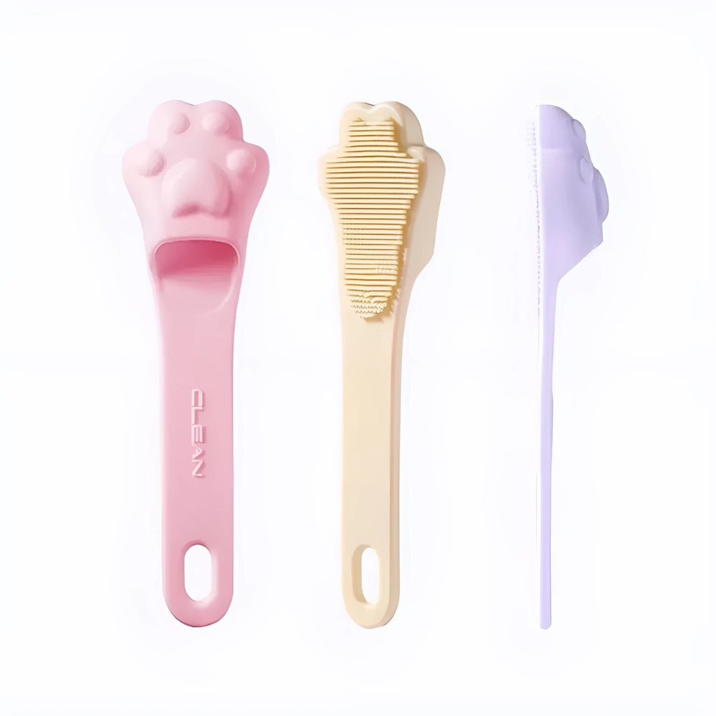 Silicone finger toothbrush for pets in pink, purple and yellow colours