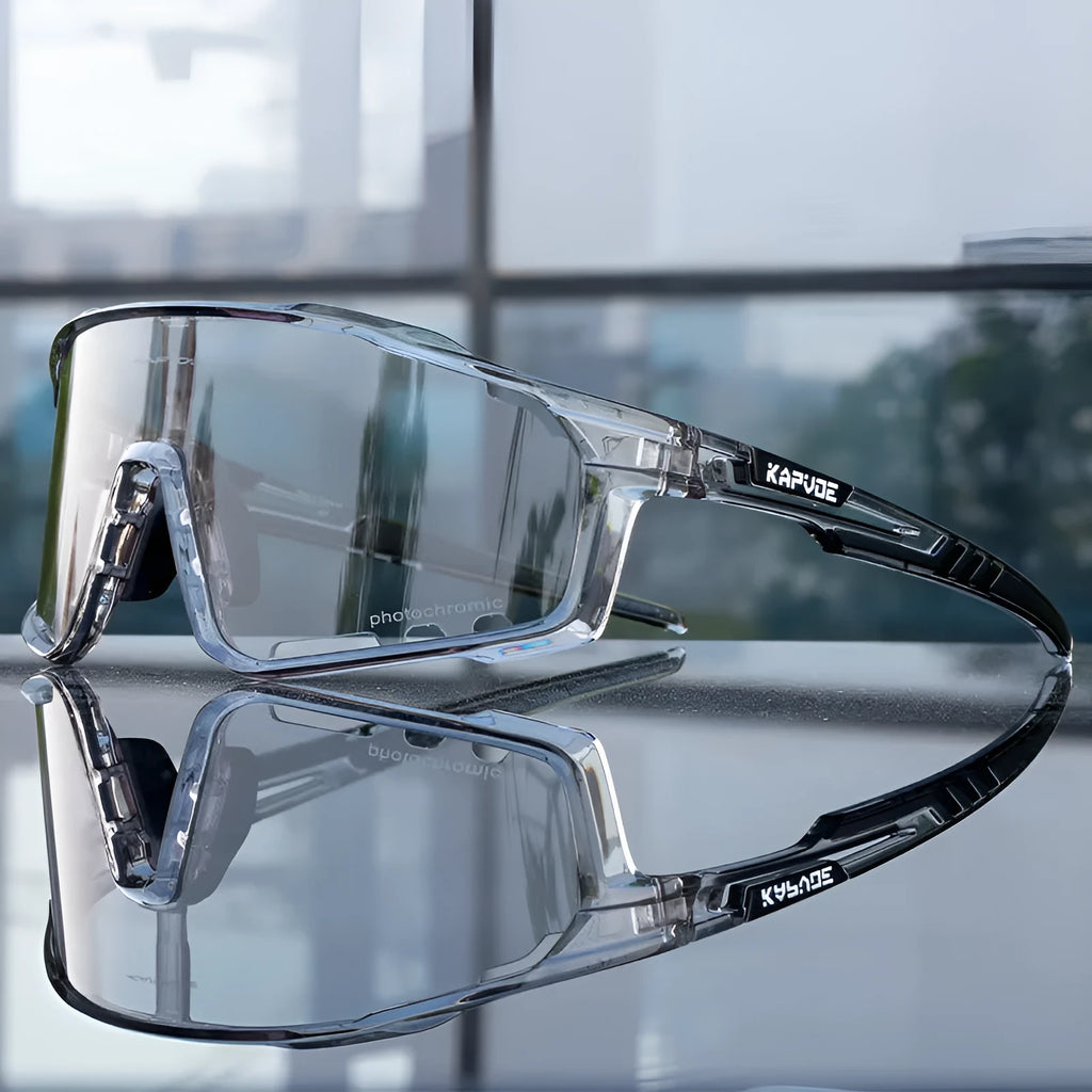 Photochromic cycling sunglasses with semi-rimless TR90 frame and adaptive lens.