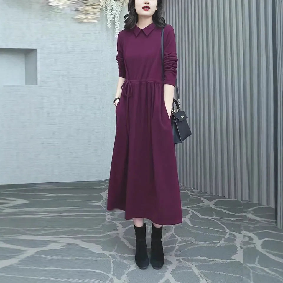 Purplish red plus size long sleeve dress with a long skirt for women.