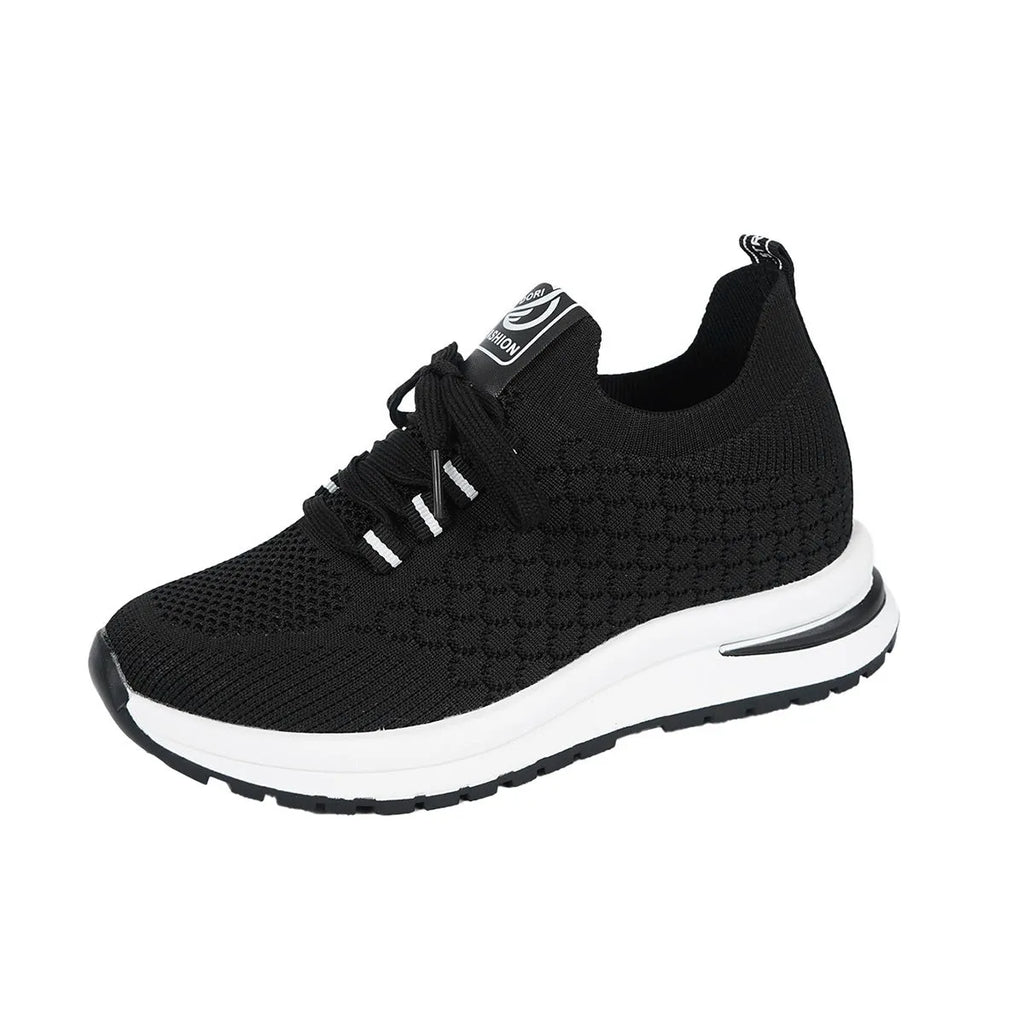 Women's black mesh lace-up sneakers with flat rubber sole and round toe