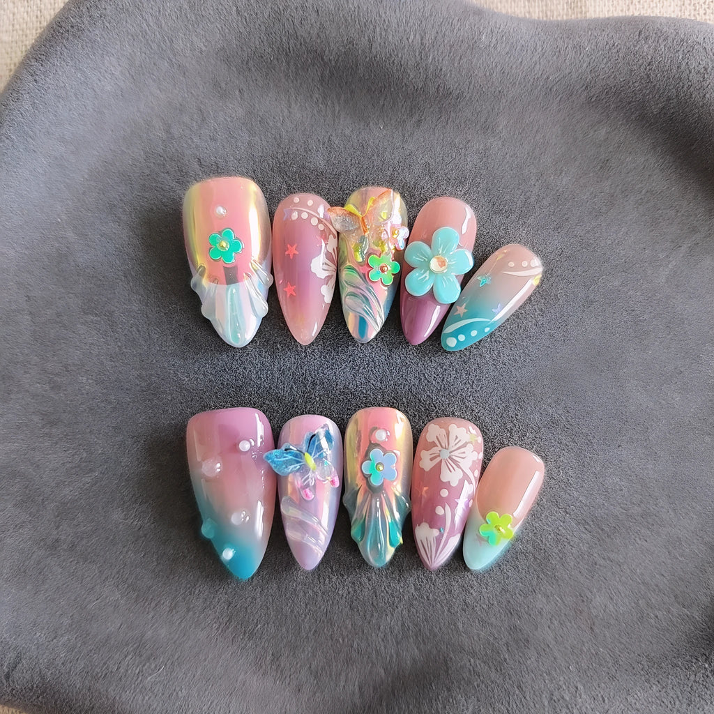 Handmade floral and butterfly nail art sculptures in four sizes for 3D manicure decorations