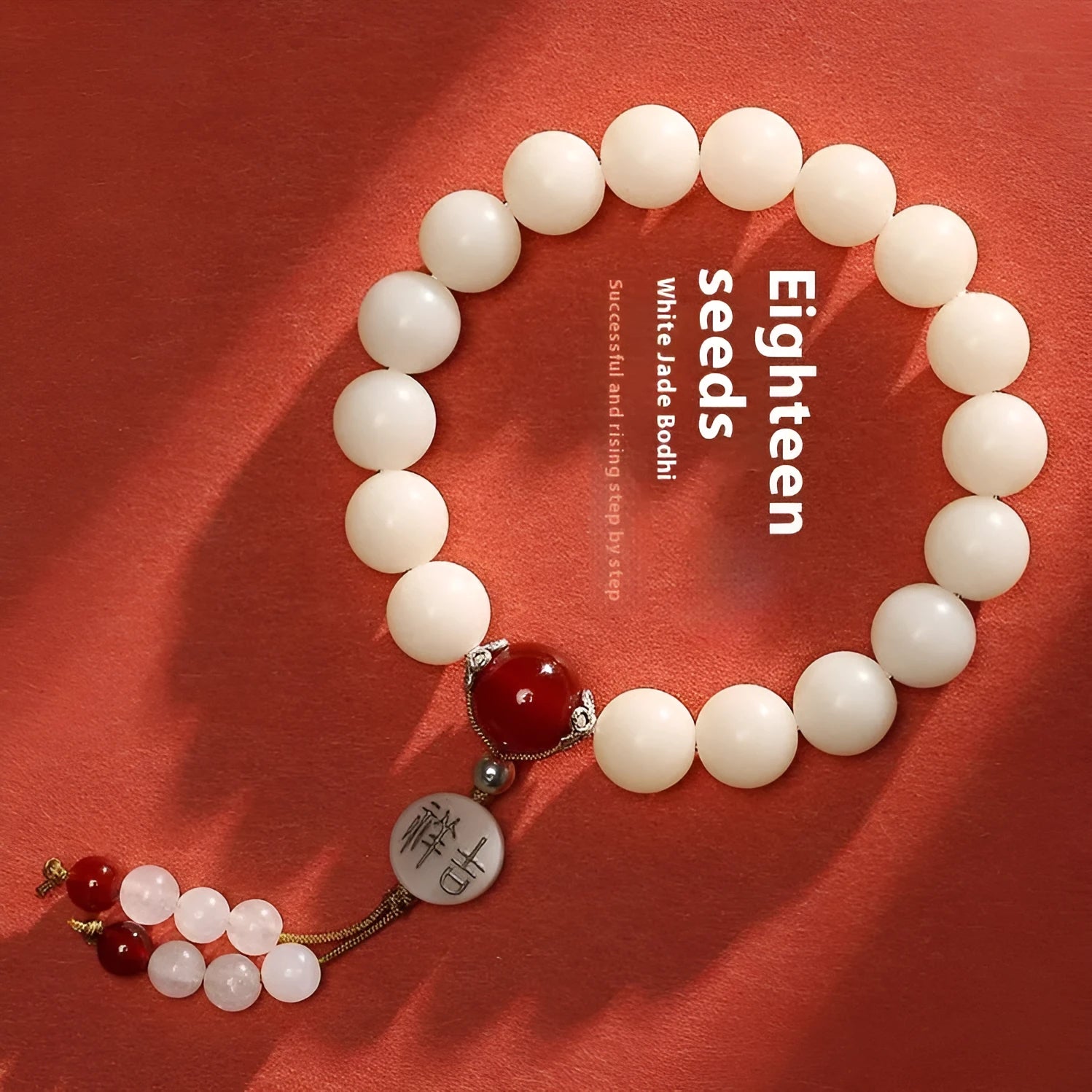 White jade bodhi couple bracelet with ruyi element and 10mm round beads.