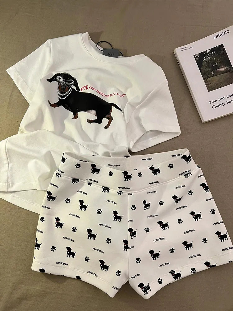 Sausage dog print short sleeve pajama set includes top and shorts in graphic-coloured suit