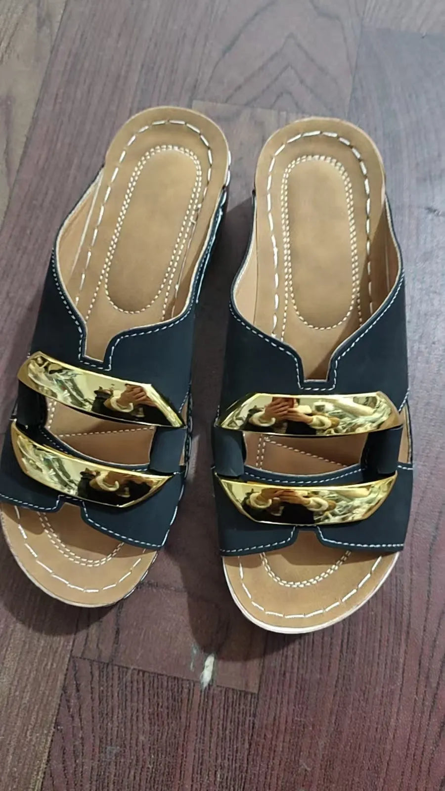 Roman style platform flip-flop sandals in a solid colour on a white background.