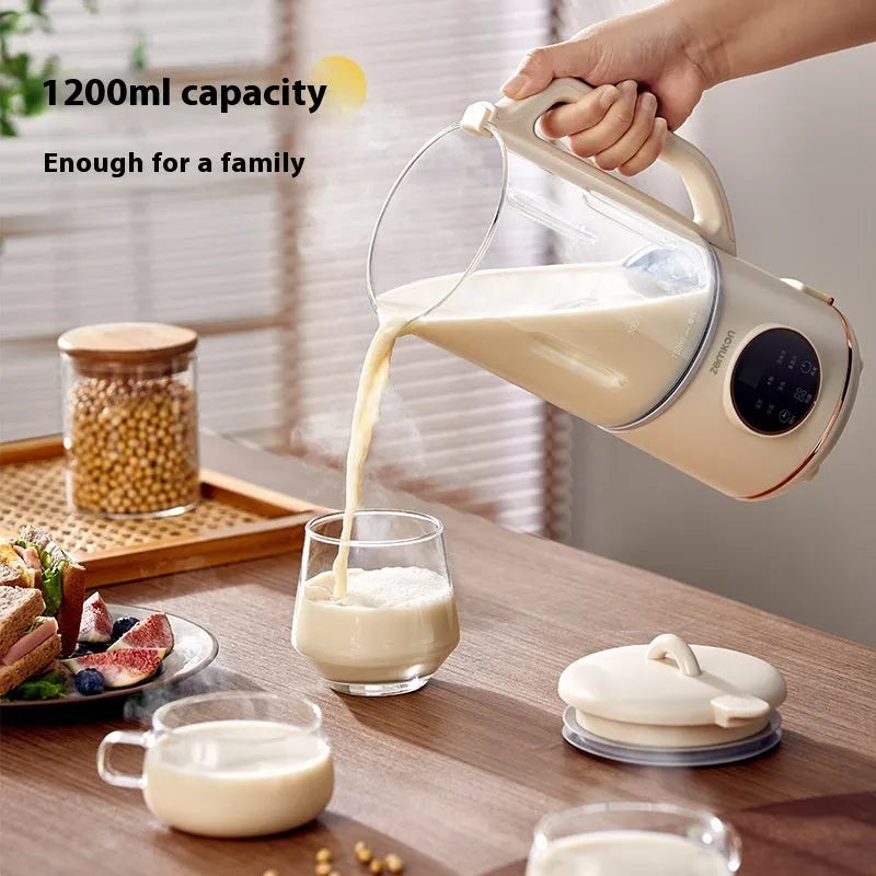 Automatic soya milk maker with glass jug in milky white colour on a kitchen countertop.