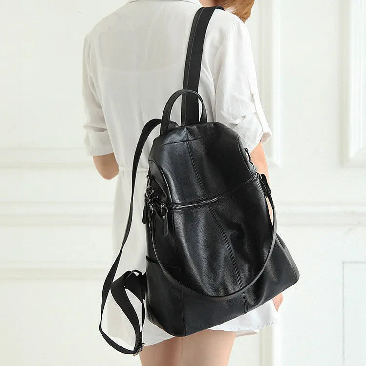 Genuine leather women's retro backpack showing organisation compartments and waterproof construction