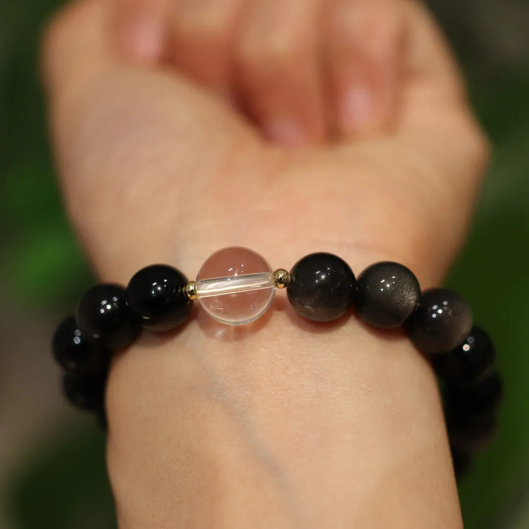 White crystal geometric bracelet with cat eye obsidian and Chinese auspicious patterns