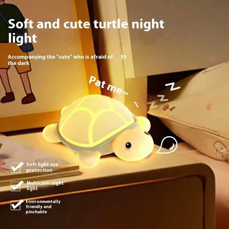 Cute turtle silicone USB rechargeable night light on a bedside table, soft glow, low voltage