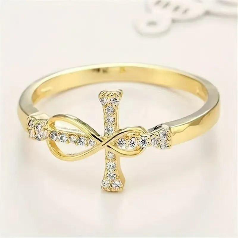 Geometric copper ring for women in gold colour finish, shown on a finger against a neutral background.