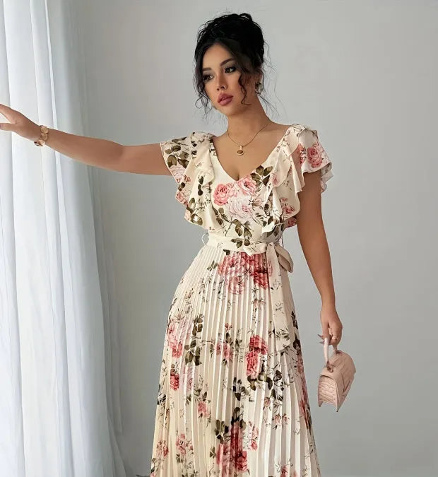 Apricot coloured V-neck dress with digital floral print, ruffled sleeves, and an oversized swing skirt.