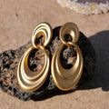 Gold double circle French retro earrings with U-shaped design and quicksand colour finish