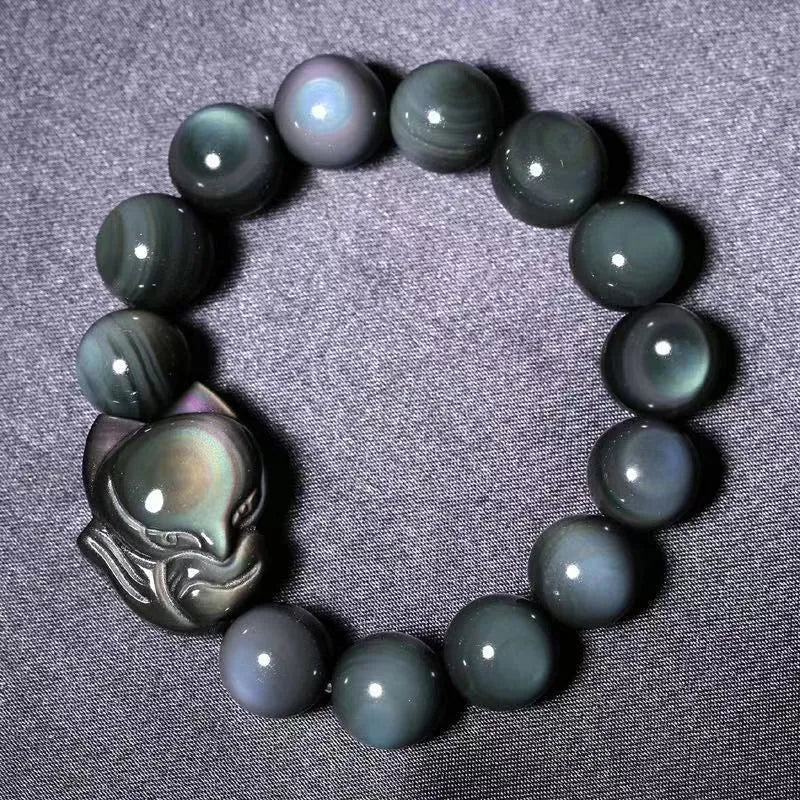 Obsidian carved fox couple bracelet showing animal zodiac design in cartoon style