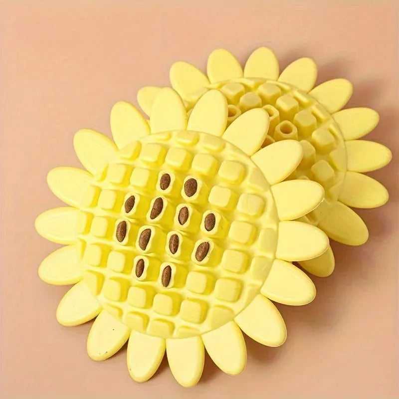 Yellow sunflower-shaped rubber dog chew toy with squeaker