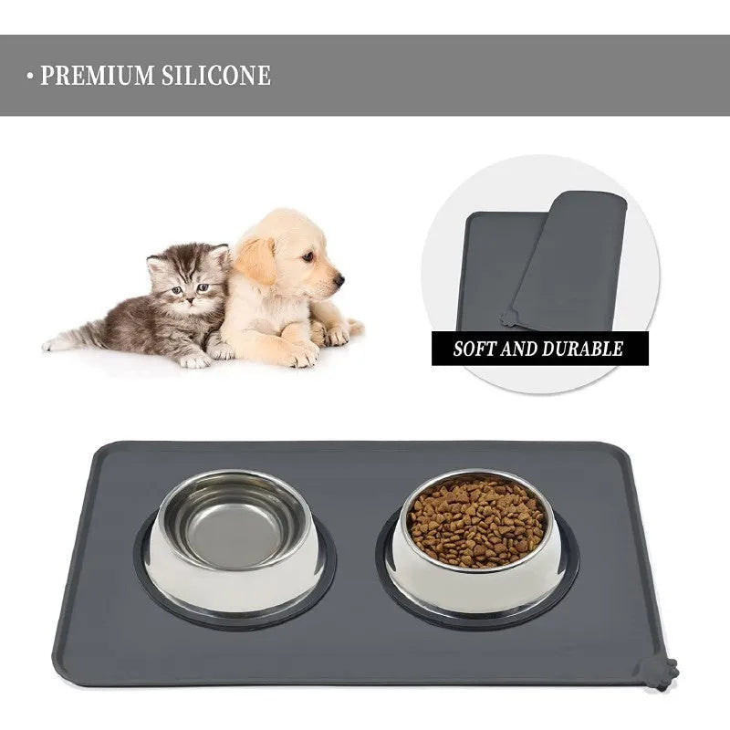 Silicone pet placemat under a dog bowl in grey colour on a kitchen floor.