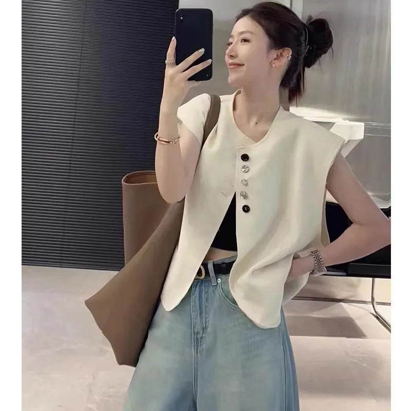 Women's loose-fit short-length polyester vest in milky white with side pockets