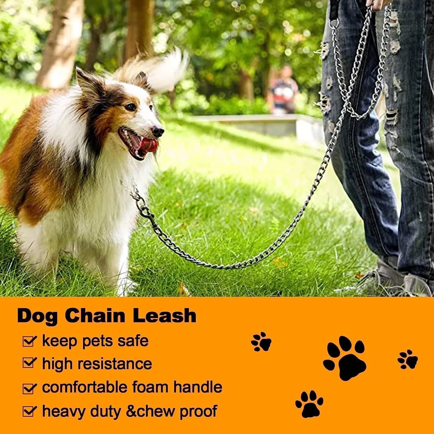 Heavy duty metal dog leash with chew-proof chain and soft black padded handle on a concrete background.