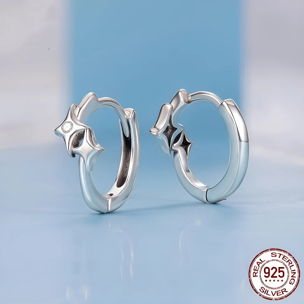 Fashion Star S925 sterling silver earrings with inlaid zircon, colour BSE1210, on display