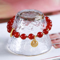 Natural red agate bracelet with woven construction and blessing card