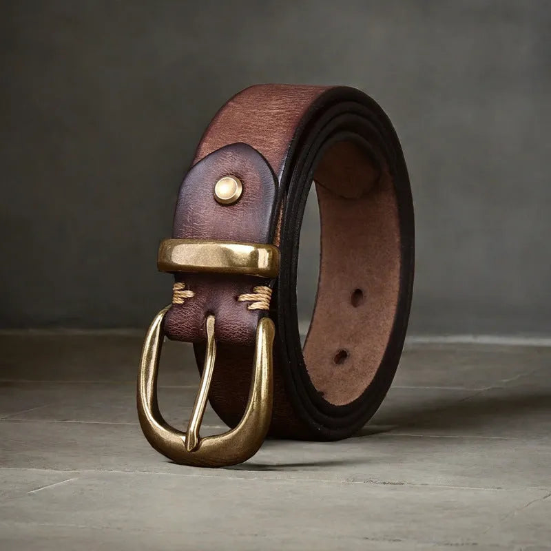 Men's casual leather belt in black with copper buckle showing length adjustment holes
