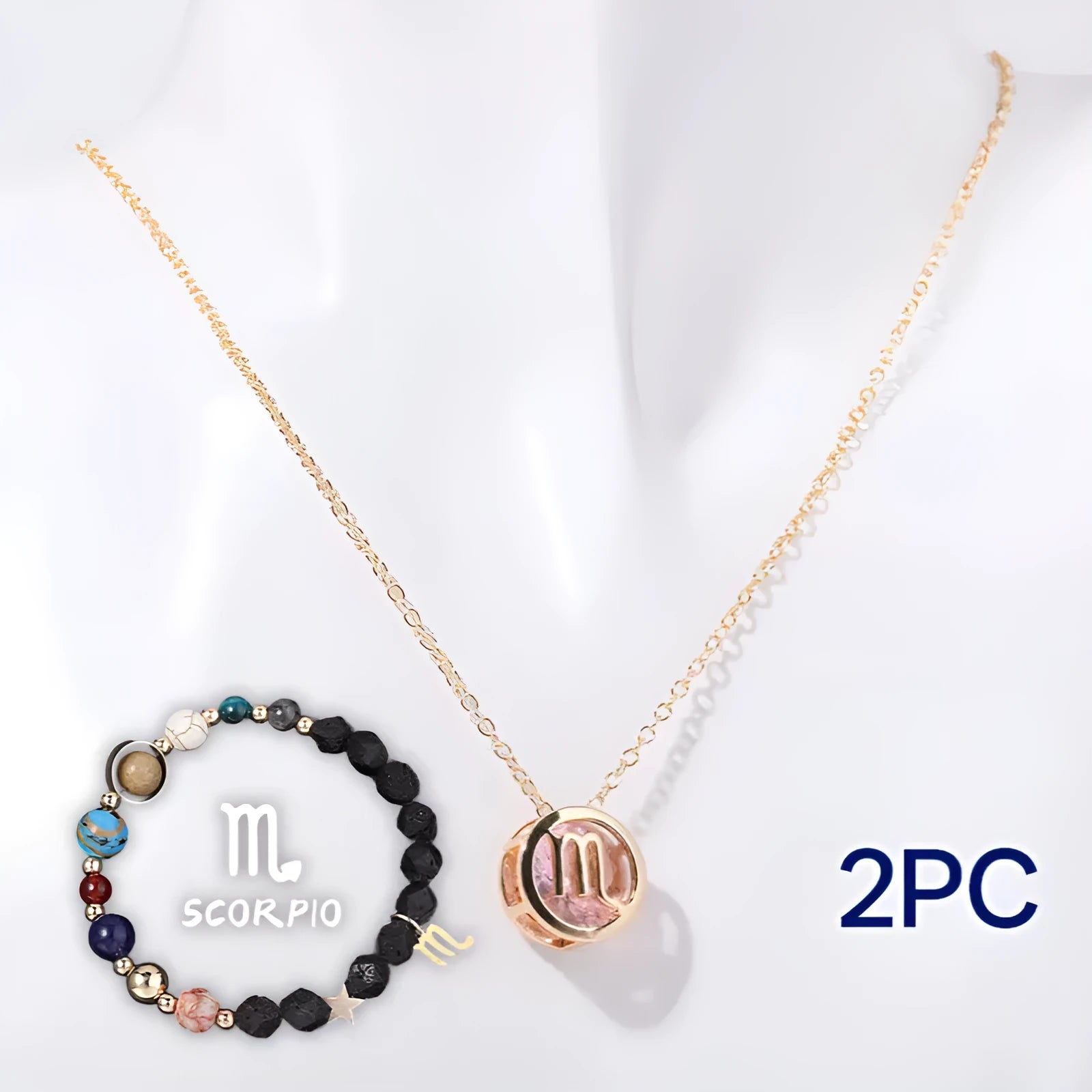 A natural stone beaded necklace and matching bracelet set laid flat, showing the textured stone beads.
