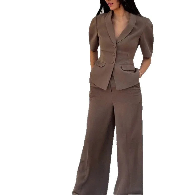 Men's brown polyester slim fit suit set with long sleeves and matching trousers on hanger