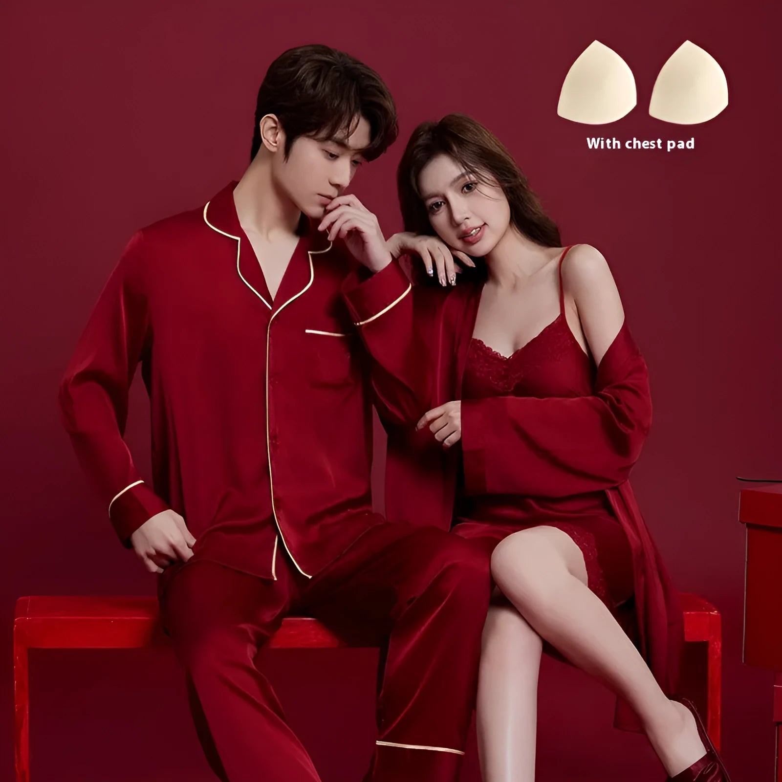 Red long-sleeved ice silk sleepwear set for a man and woman laid out flat.