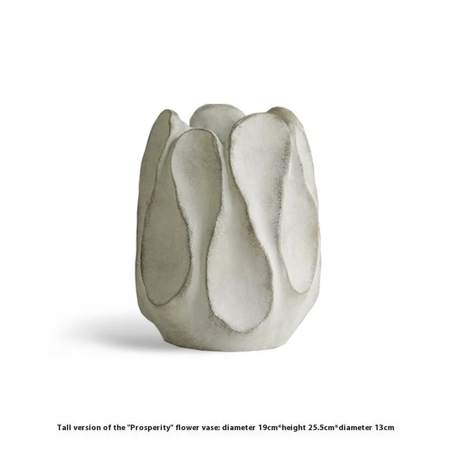 Irregular ceramic vase with artistic form for flower arrangements in magnesium clay construction
