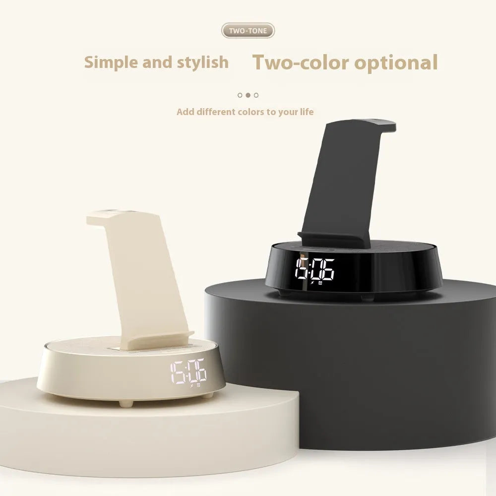 Wireless Bluetooth speaker alarm clock with phone holder in creamy-white colour on a wooden bedside table