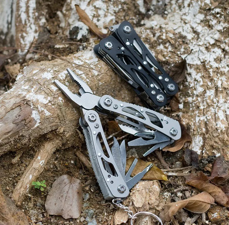 All steel multi-function pliers in black and silver grey with 14-in-one functions, 420 steel body, and 15.6cm developed length
