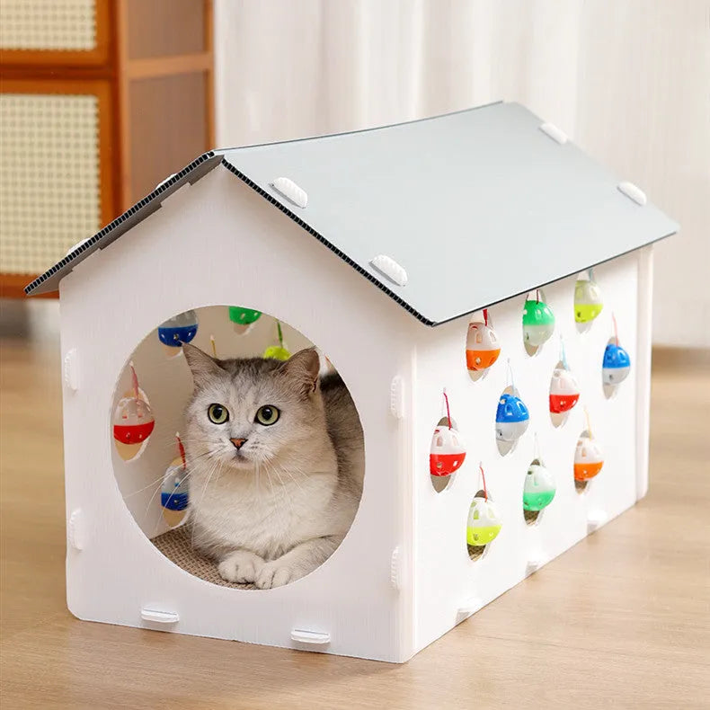 Plastic integrated cat scratch board, nest bed, and tunnel toy with a bell.
