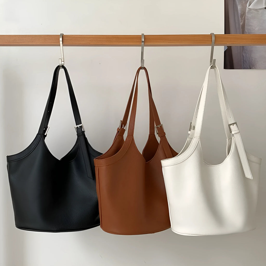 Idle Style light retro PU soft leather large capacity commuter shoulder bag in black with bucket shape and double straps