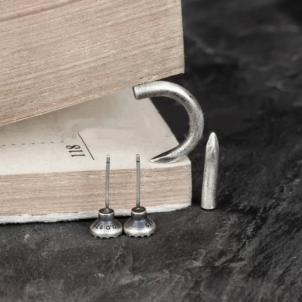 S925 sterling silver punk stud earrings with straight or curved nail designs in retro style