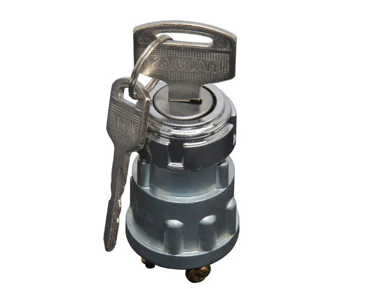 Copper vehicle ignition switch with key for trucks and forklifts.