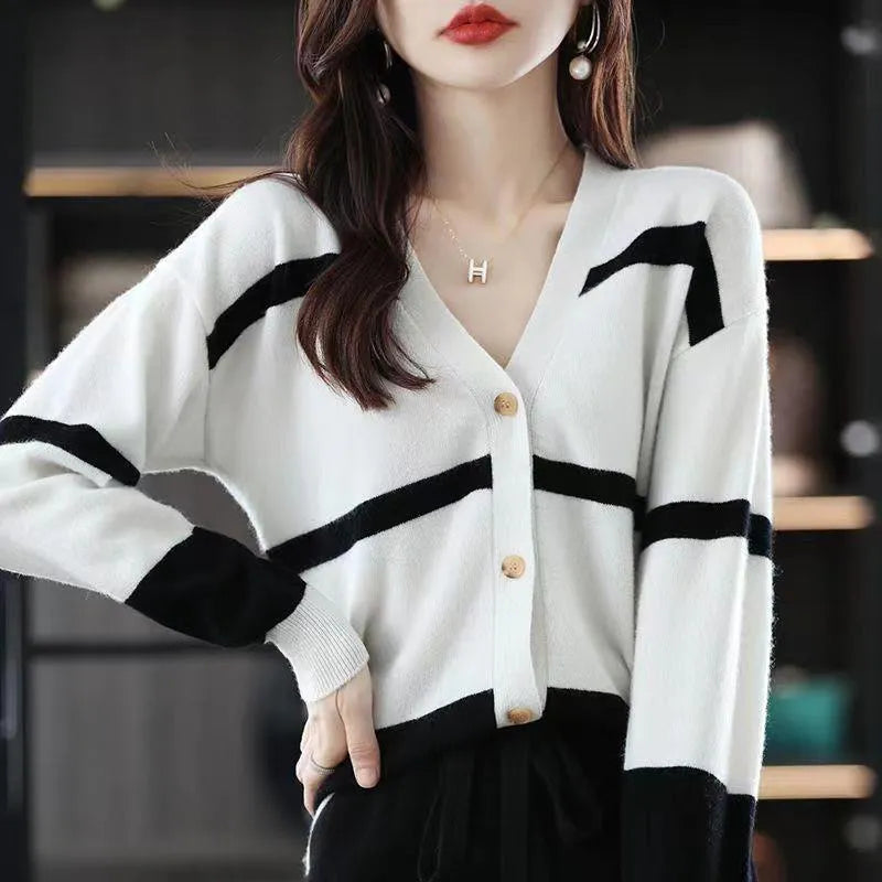 Women's V-neck knitted cardigan with 3D striped pattern in slim fit showing colour options