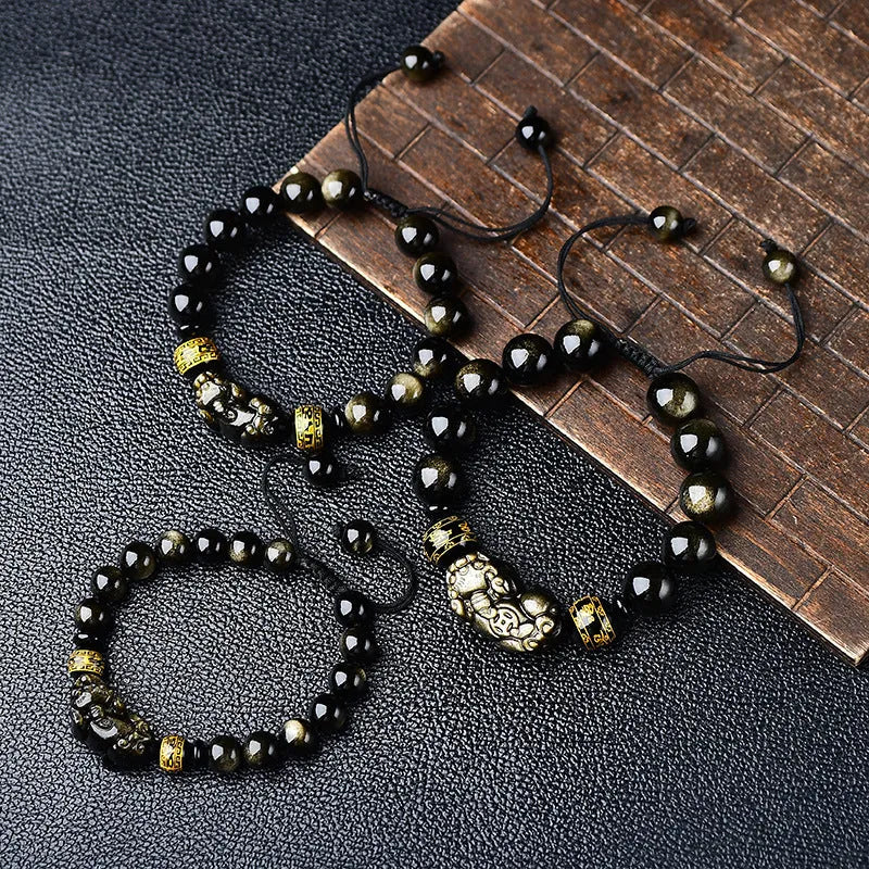 Hand-woven golden obsidian Pi Xiu bracelet with zodiac animal design in Chinese style