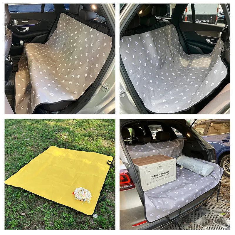 Water resistant dog car seat cover mat on a rear car seat in a bone print pattern.