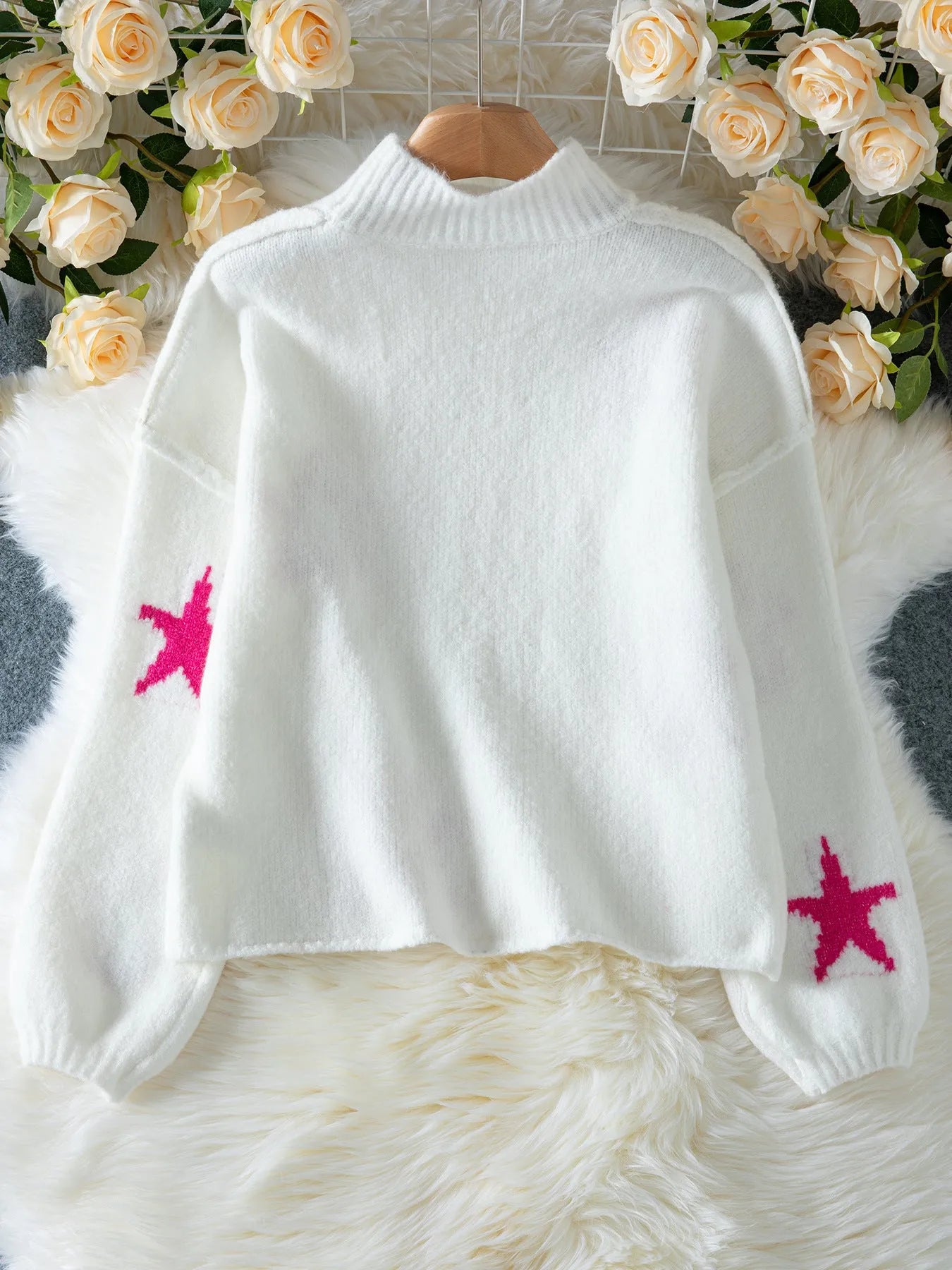 White women's loose turtleneck pullover sweater with a five-pointed star pattern in imitation velvet fabric.