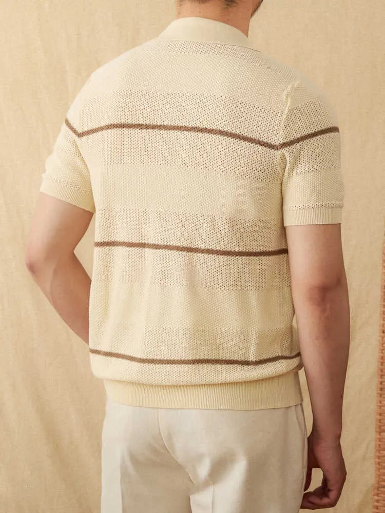 Men's camel coloured short sleeve knitted cardigan with a lapel collar on a hanger.