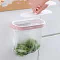 Blue plastic kitchen garbage bag storage rack on a countertop.