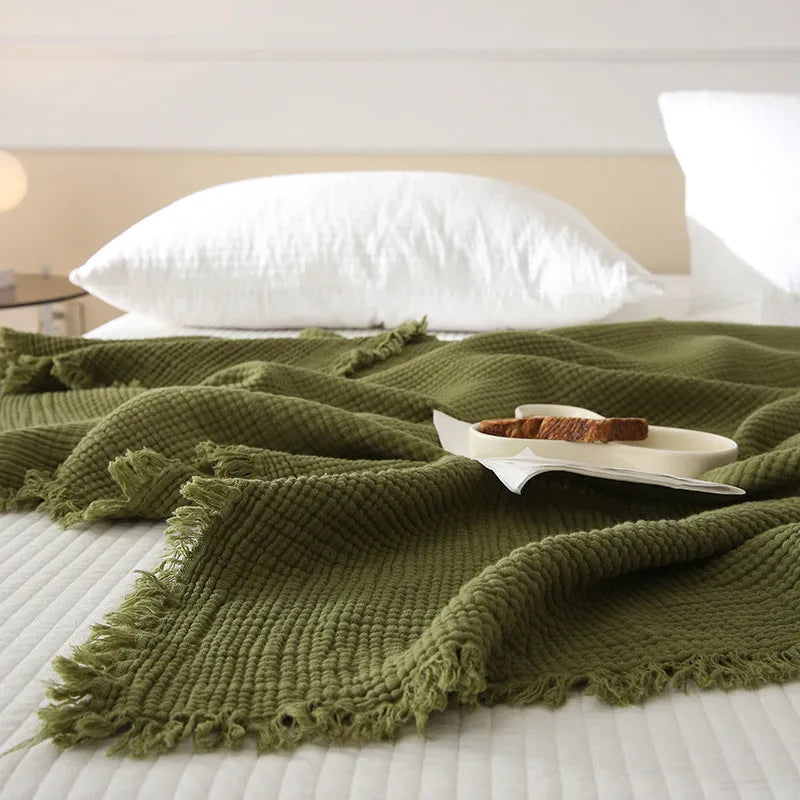 Four-layer gauze cotton blanket with tassel trim in an array of ten colours
