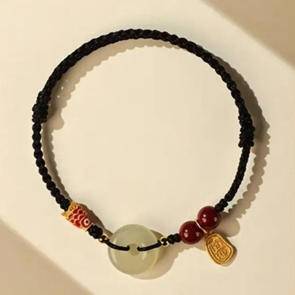 Hetian Jade peace buckle bracelet with koi fish charm on braided rope