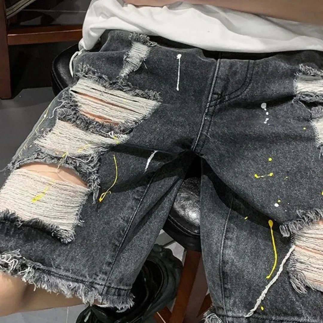 Men's loose fit water washed denim shorts with hole detailing in black and light blue colours