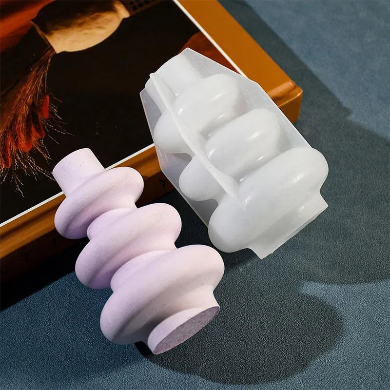 Silicone crafting mould for making three-layer irregular circle vase ornaments in small and large sizes.