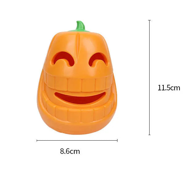 Orange Halloween pumpkin shaped durable thermoplastic rubber dog chew toy with a treat-dispensing funnel.