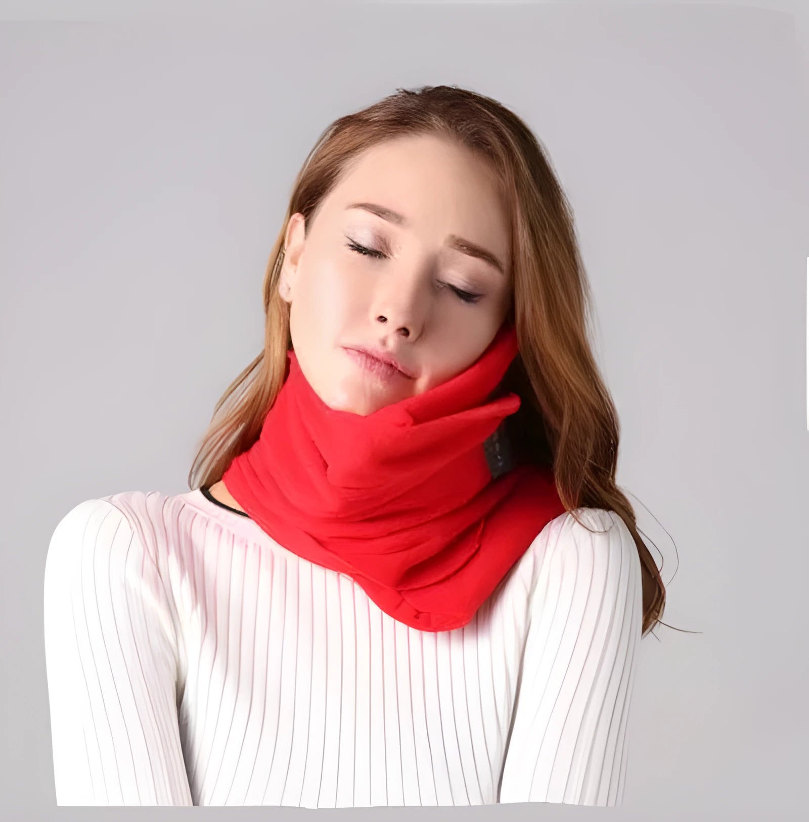 Black U-shaped neck support pillow scarf on a grey background, showing its convex form.