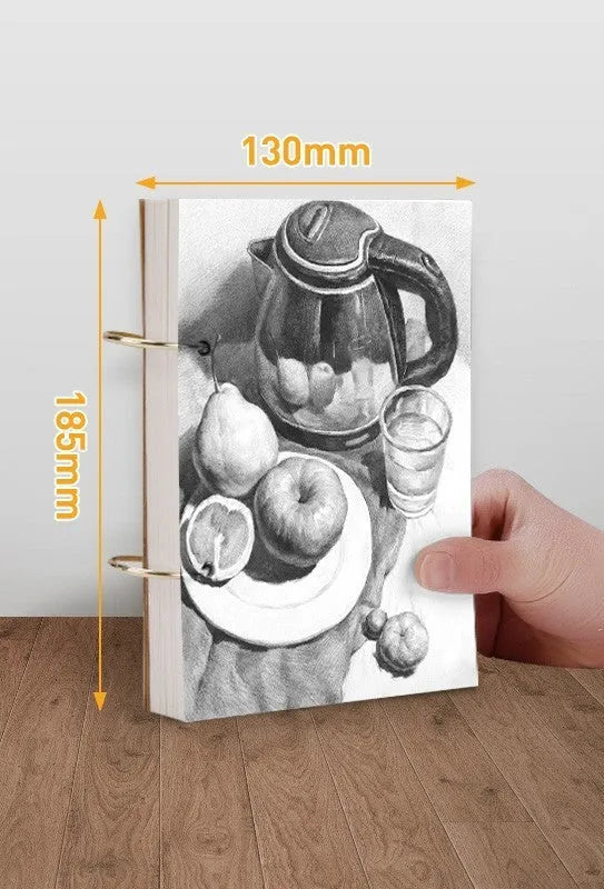 8K thickened sketchbook open showing coil binding and marker illustration on specialised paper