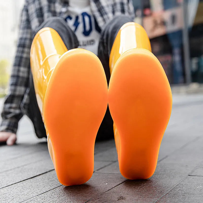 Men's white plastic rain boots with flat heel and round toe design