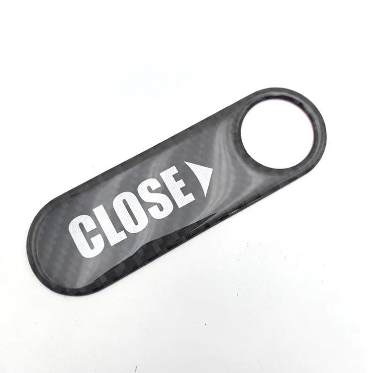 Electric trunk button sticker in carbon black with red edge for car interior modification