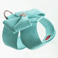 Pink microfiber dog chest strap with a bowknot, showing the harness design.